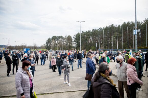 People wait for vaccines in Vilnius, near Litexpo