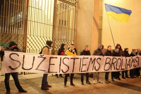 Lithuanians held a rally by the Seimas in Vilnius to express their solidarity with "the wounded brothers", as the banner says.