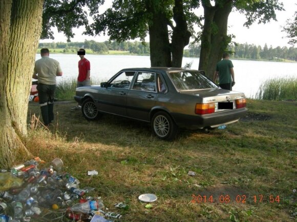 These cars were parked too close to the shore.