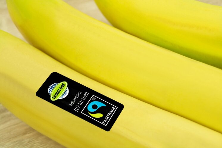„Fair Trade“ ženklas ant bananų
