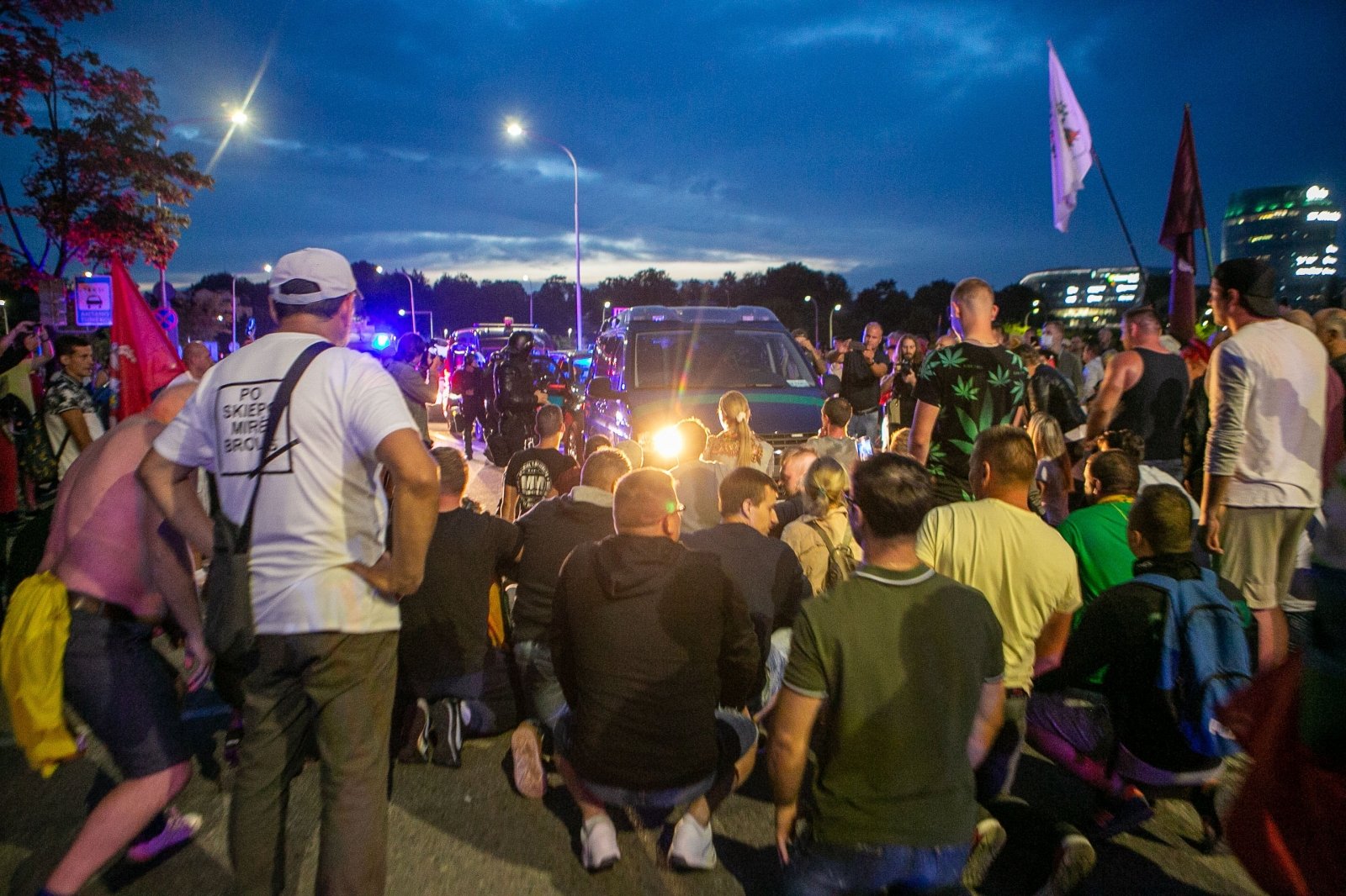 Behind the bars – a rioter unmasked by the protesters themselves and surrendered to the police during the Cellophane broadcast